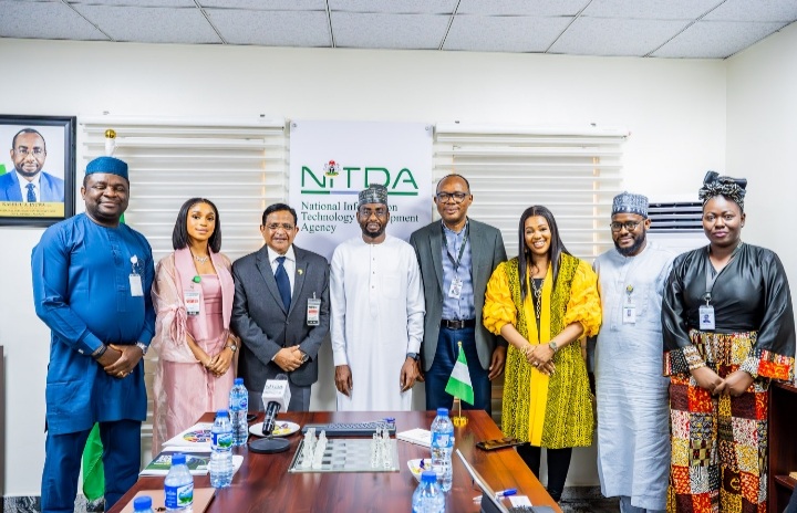 Group photo of DG NITDA Kashifu Inuwa CCIE (5th right) with the CEO village, Sunil Santanam (3rd left) alongside members of staff of both organisations