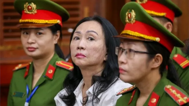 EPA Truong My Lan (C), chairwoman of Van Thinh Phat Holdings, sits during her trial at the Ho Chi Minh City People"s Court in Ho Chi Minh City, Vietnam, 11 April 2024.EPA