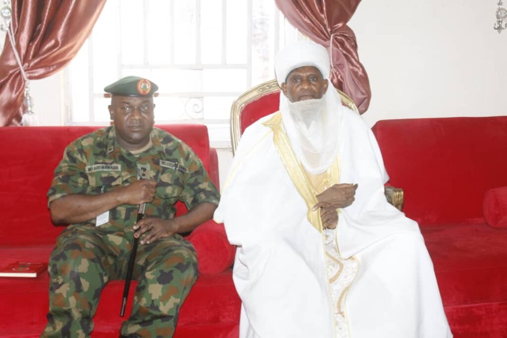 Emir of Kotorkashi, His Royal Highness, Abubakar Ahmad Umar withBrigadier General Mohammed Dahiru Abumawashi, the Deputy Director Coordination of Media Operations During a media tour of Defence Correspondents to the monarch's palace in Zamfara State