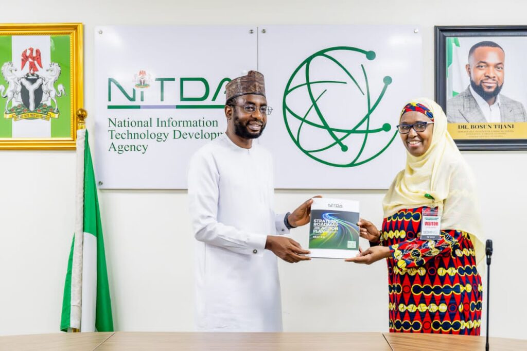 DG NITDA, Kashifu Inuwa CCIE (left) presenting the agency’s SRAP 2.0 document to the Director, ACEPHAP, Prof. Hadiza Galadanci (right) at the corporate headquarters of NITDA in Abuja