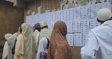 Voters checking their names