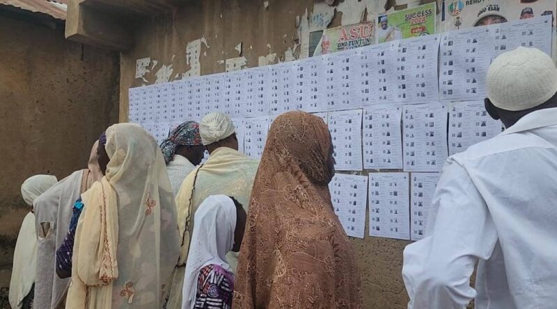 Voters checking their names