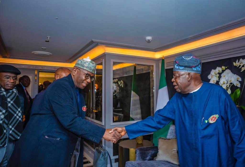 Gov. AbdulRahman AbdulRazaq of Kwara State in a handshake with President Bola Ahmed Tinubu