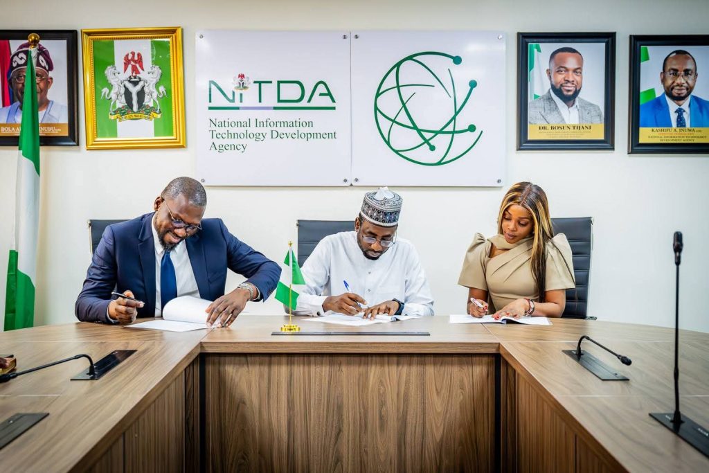 DG, NITDA, Kashifu Inuwa, CEO Flutterwave, Olugbenga Agboola, and Alami's CEO, Ms. Olu White during signing of the MoU