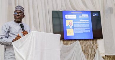 DG NITDA's rep, Dr. Onimisi giving a presentation at the workshop organised by the NIQS FCT Chapter at the National Engineering Centre in Abuja
